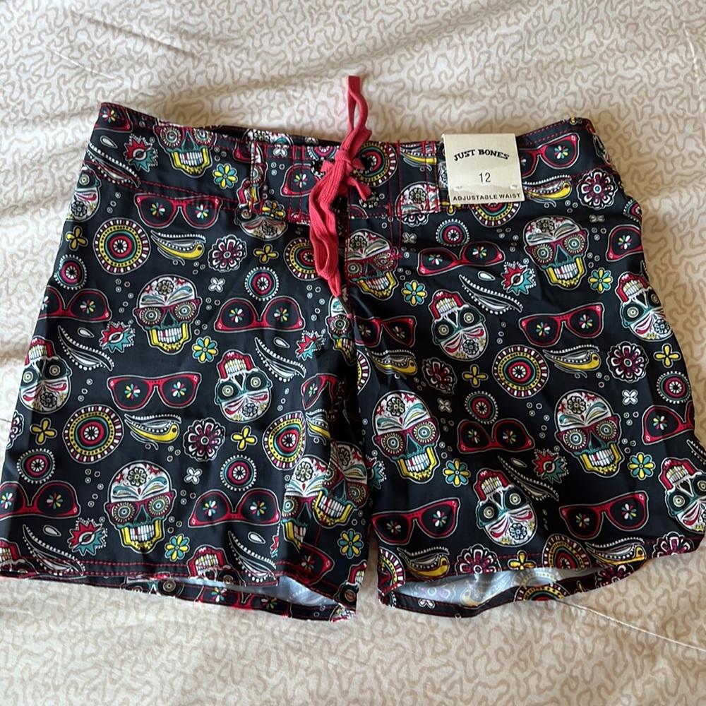 NWT Just Bones Boardwear girls board shorts in size 12